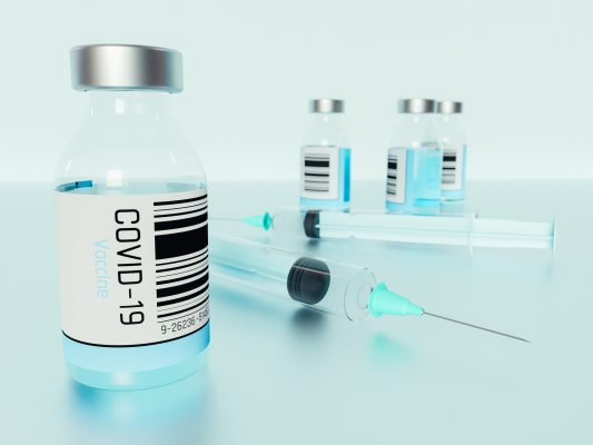 3D Illustration. Covid-19 vaccine bottles.