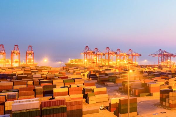 container-wharf-in-nightfall-international-import-2021-08-26-17-53-23-utc