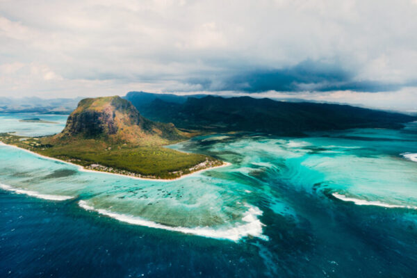 A bird's-eye view of Le Morne Brabant, a UNESCO world heritage site.Coral reef of the island of Mauritius.Storm cloud