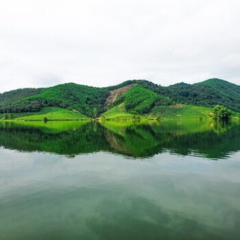 a-lake-and-reflection-of-green-hill-in-thanh-an-v-2022-11-11-21-20-19-utc