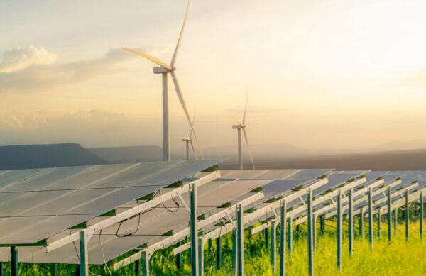 Sustainable energy. Solar and wind turbines farm. Sustainable re