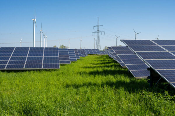 solar-panels-wind-turbines-and-electricity-pylons-2023-06-02-23-28-26-utc